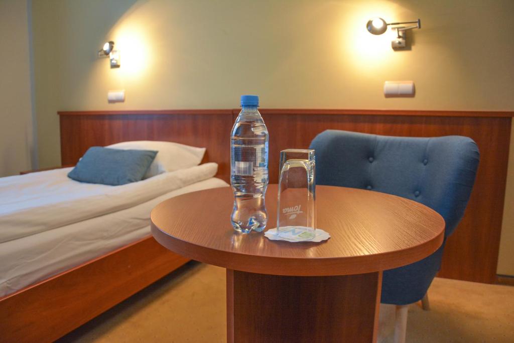 Postel nebo postele na pokoji v ubytování Hotel Neo