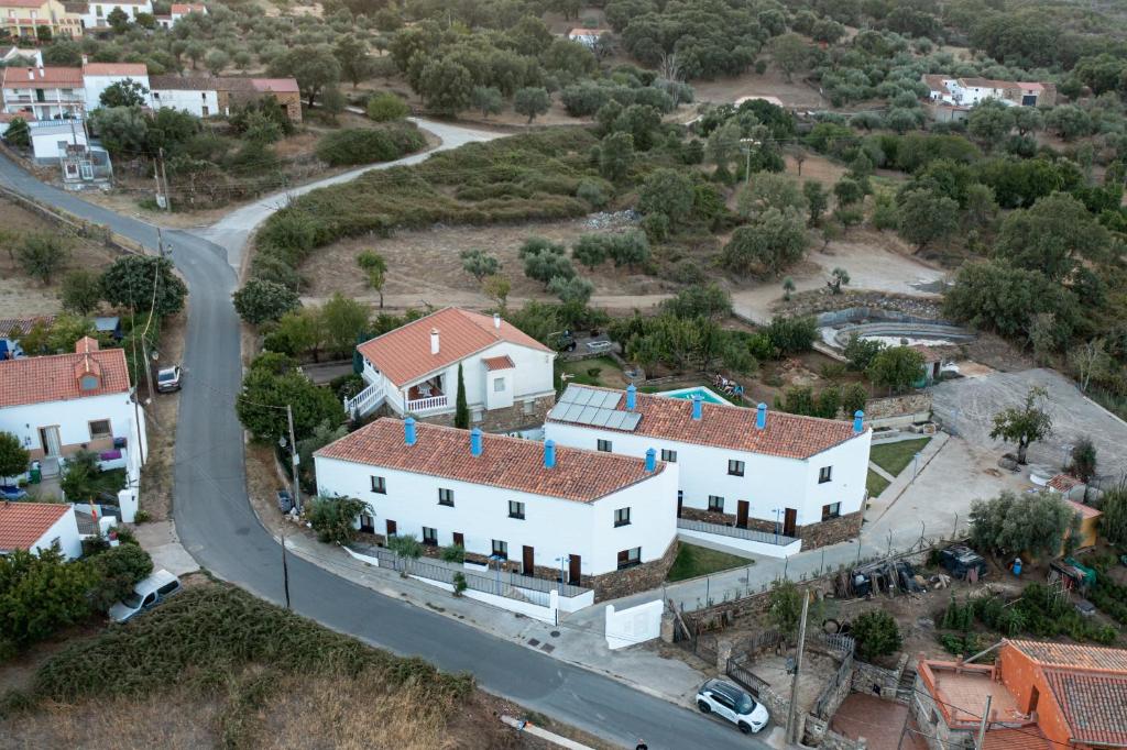an aerial view of a village with white houses at Apartamentos Rurales la Campiña in Casiñas Bajas
