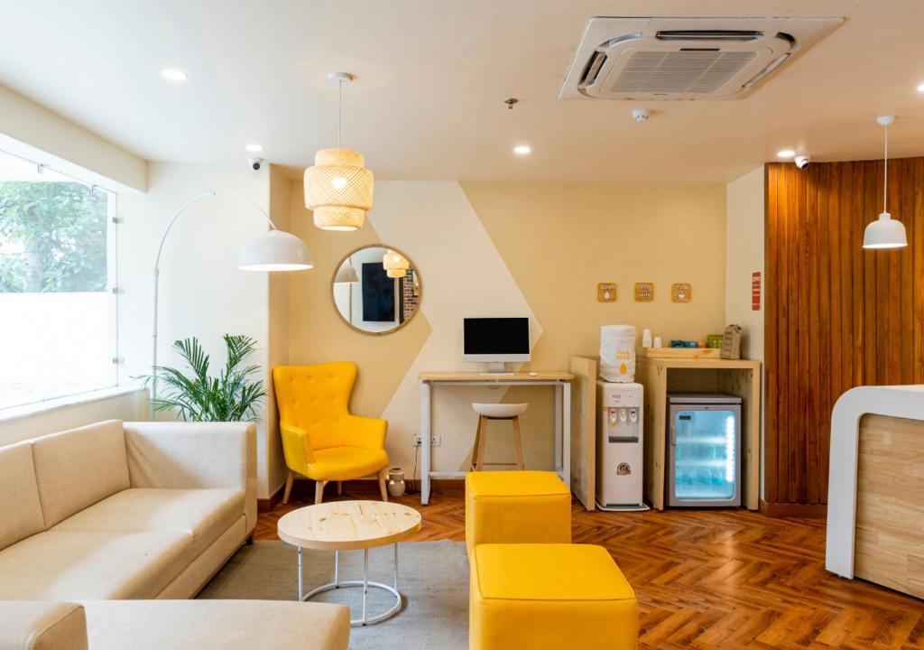 TV a/nebo společenská místnost v ubytování Bloom Hotel - Sector 19