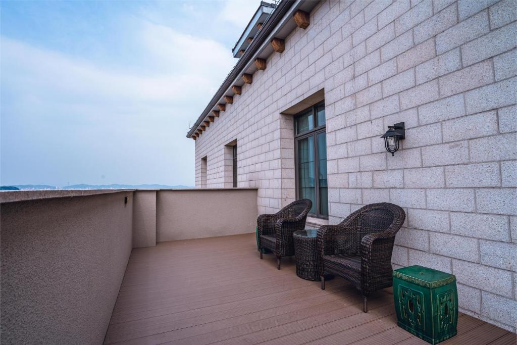 Balkón nebo terasa v ubytování Guangzhou Nansha Stone Inn