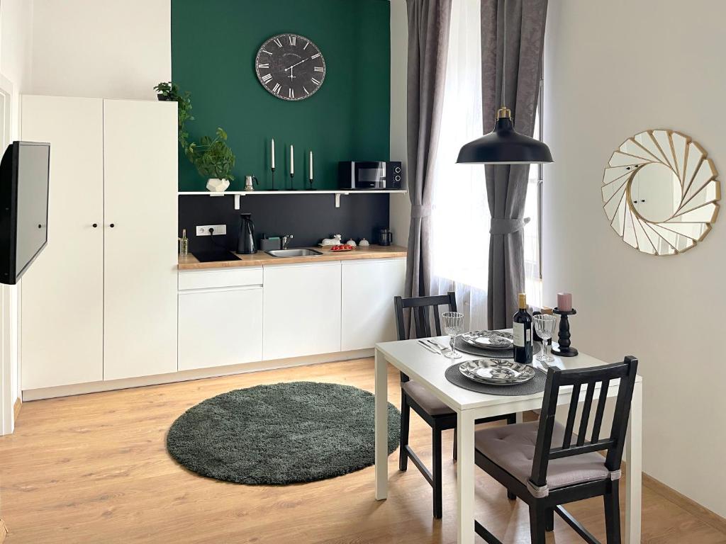 Kuchyňa alebo kuchynka v ubytovaní Piotrkowska122 Studio Apartments