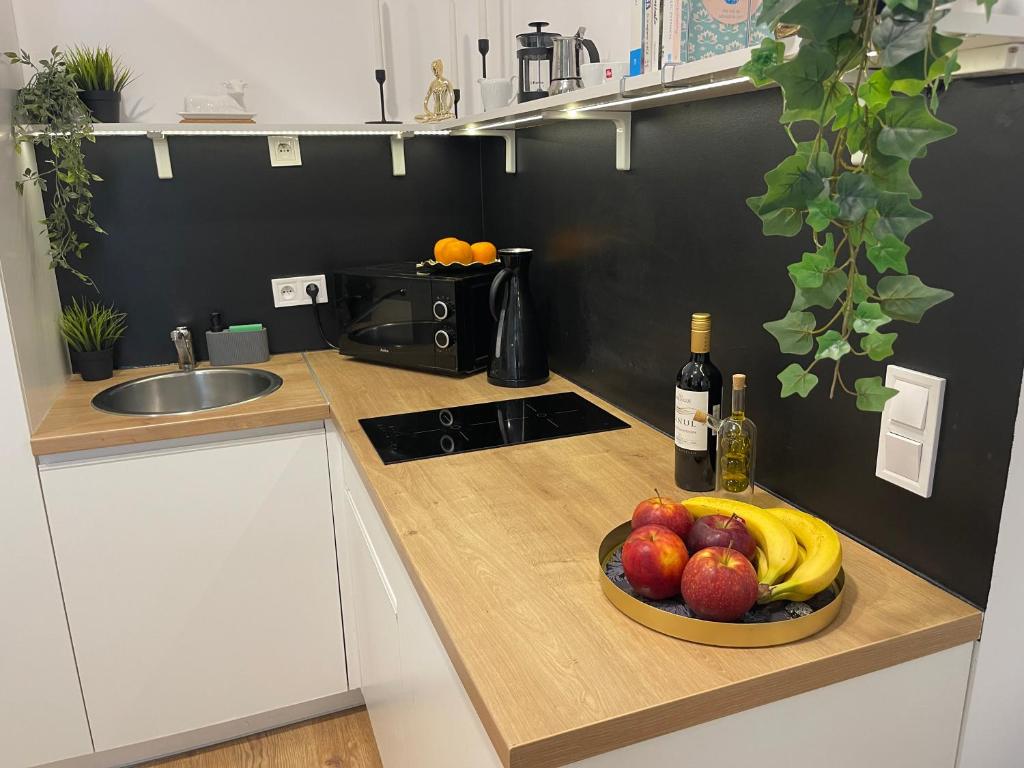 Kuchyňa alebo kuchynka v ubytovaní Piotrkowska122 Studio Apartments