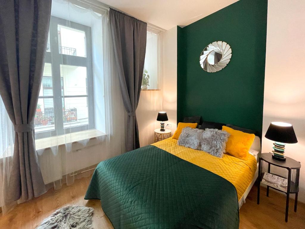 Posteľ alebo postele v izbe v ubytovaní Piotrkowska122 Studio Apartments