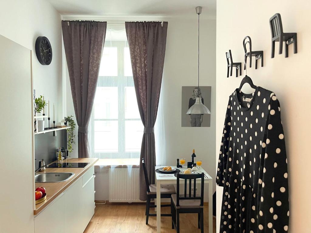 Kuchyňa alebo kuchynka v ubytovaní Piotrkowska122 Studio Apartments