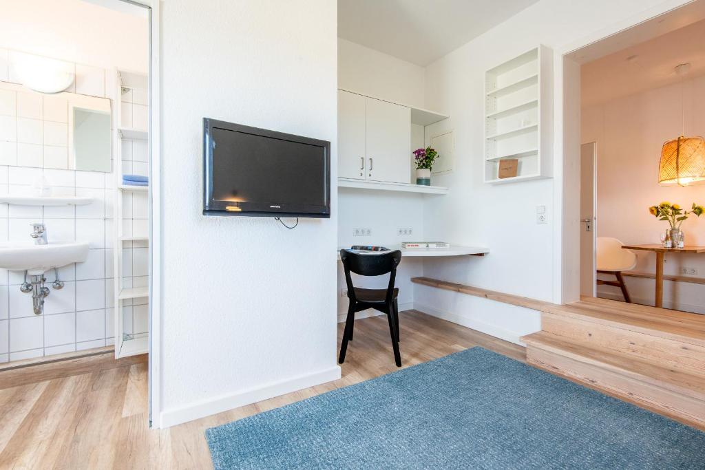 Kuchyň nebo kuchyňský kout v ubytování Steger-Hüs Wohnung 26