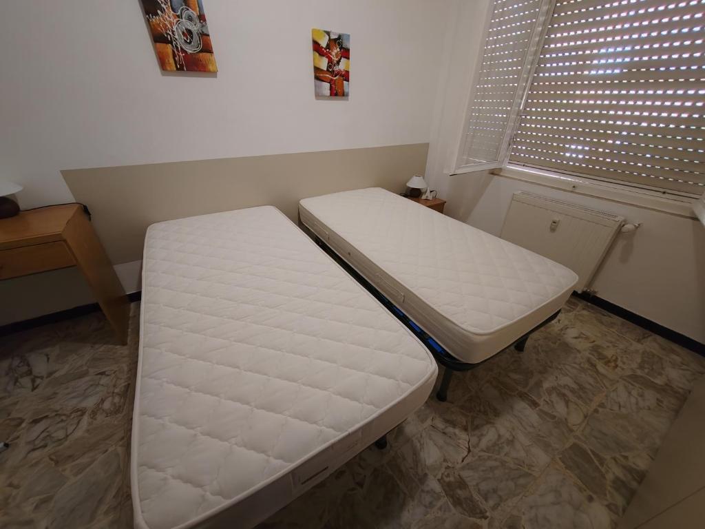 Posteľ alebo postele v izbe v ubytovaní Casa Serena