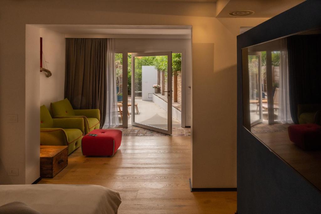 Postel nebo postele na pokoji v ubytování Praia Art Resort - Small Luxury Hotels of the world