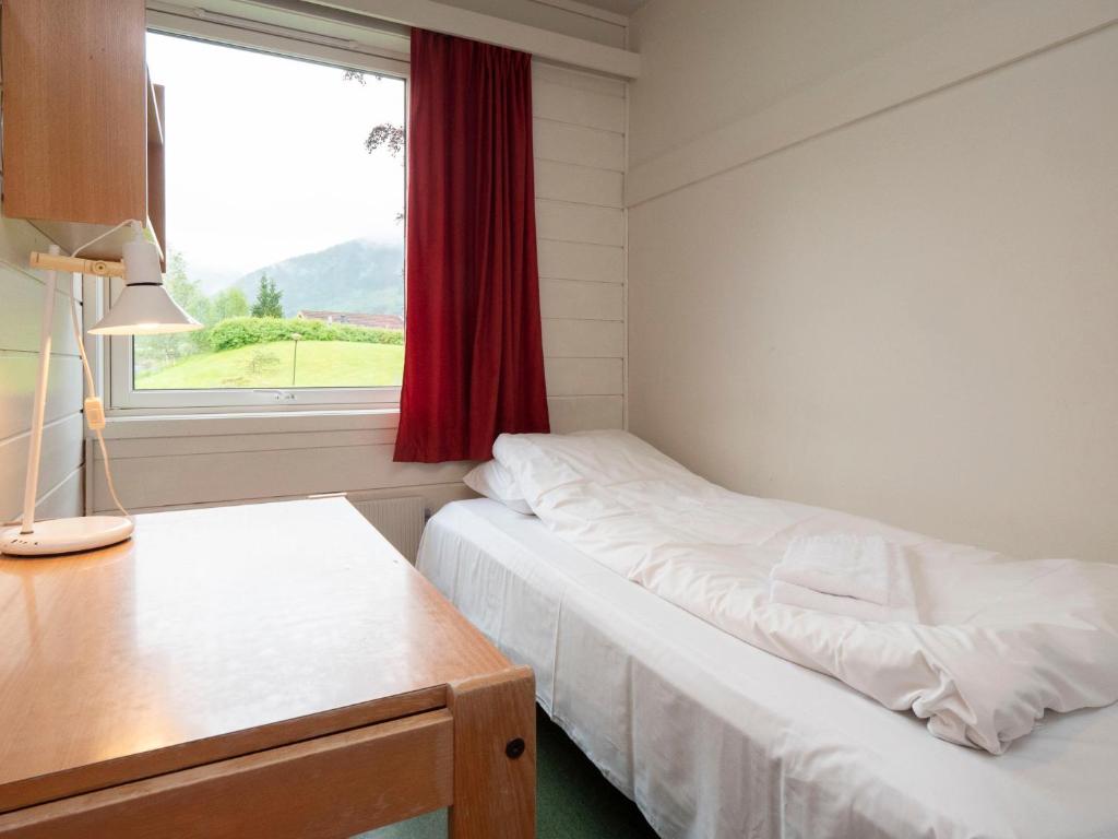 Postel nebo postele na pokoji v ubytování Førde Sommarhotell