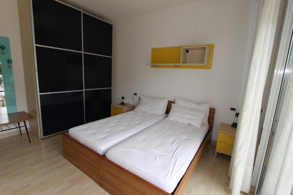 Postel nebo postele na pokoji v ubytování Residences La Rustica & Elite