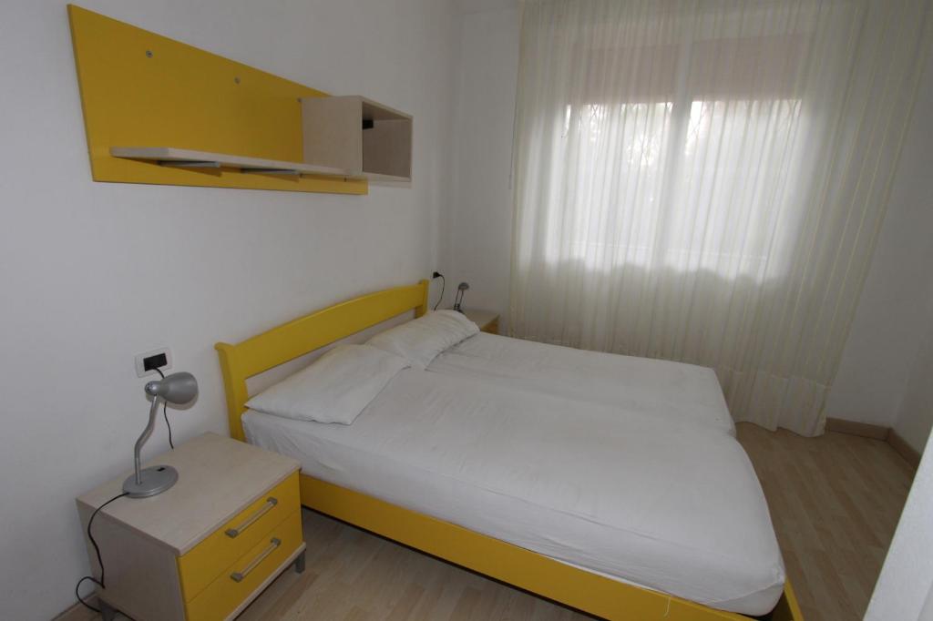 Postel nebo postele na pokoji v ubytování Residences La Rustica & Elite