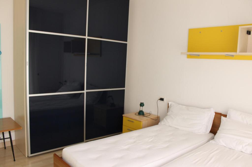 Postel nebo postele na pokoji v ubytování Residences La Rustica & Elite