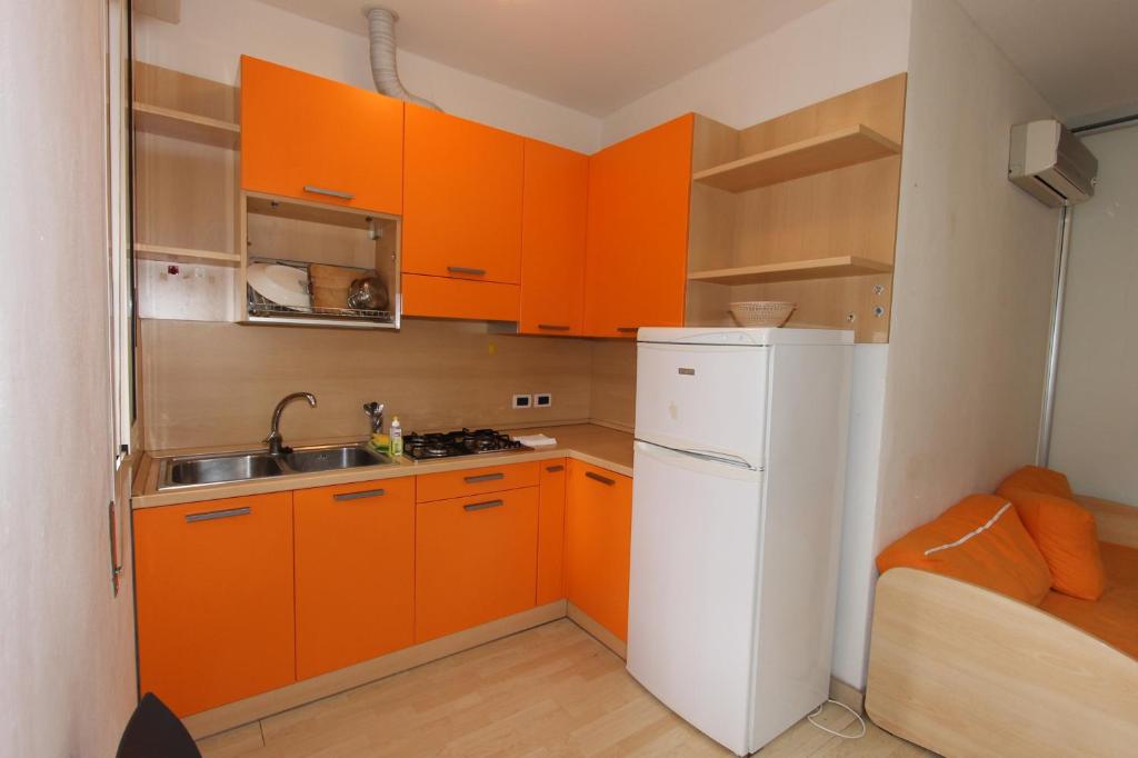 Kuchyň nebo kuchyňský kout v ubytování Residences La Rustica & Elite