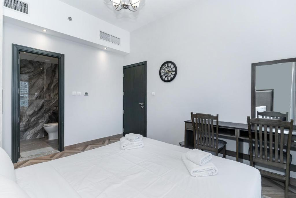 Postel nebo postele na pokoji v ubytování Group Stay I Near Dubai Mall I Family friendly