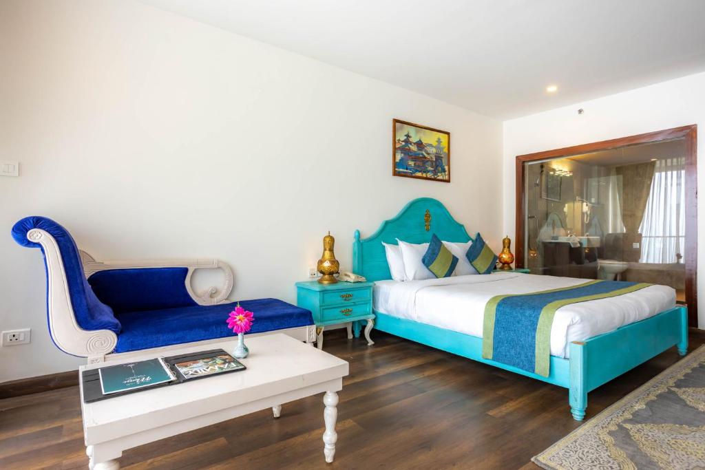 Postel nebo postele na pokoji v ubytování Aagantuk Resort