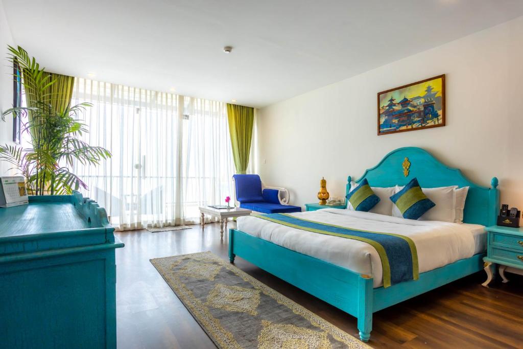 Postel nebo postele na pokoji v ubytování Aagantuk Resort
