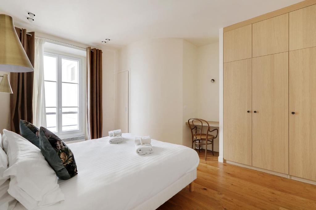 Poste&#x13E; alebo postele v izbe v ubytovan&iacute; Pick A Flat&#39;s Apartments in Madeleine - Rue Tronchet