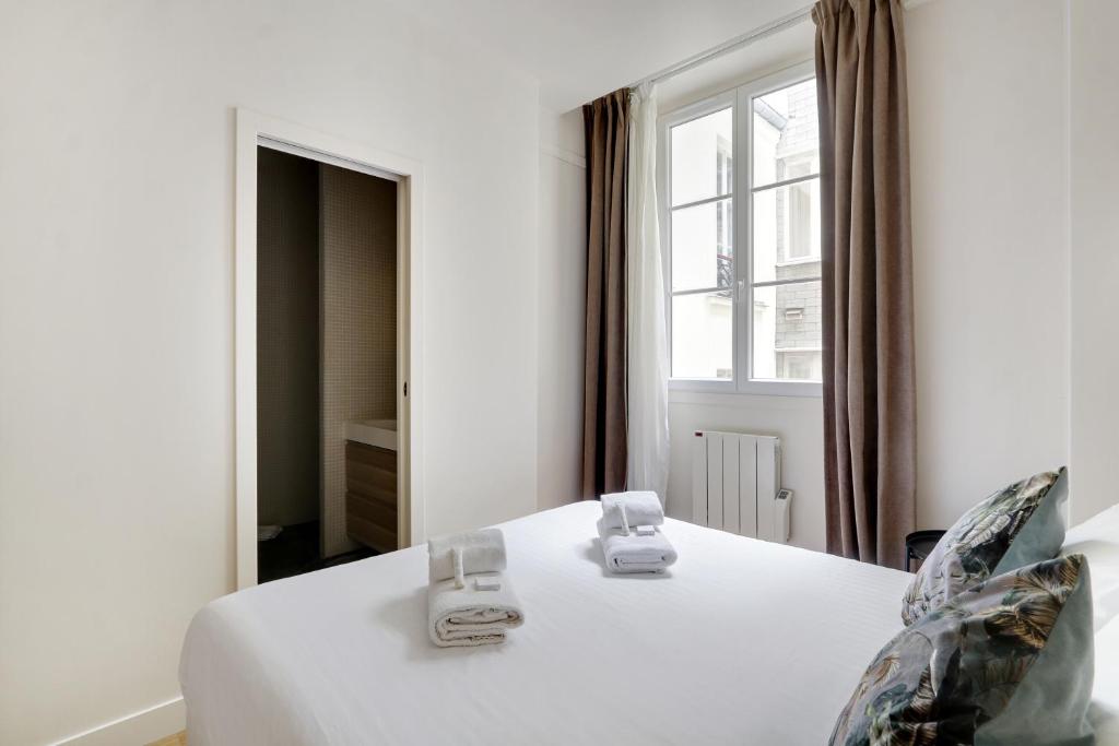 Poste&#x13E; alebo postele v izbe v ubytovan&iacute; Pick A Flat&#39;s Apartments in Madeleine - Rue Tronchet