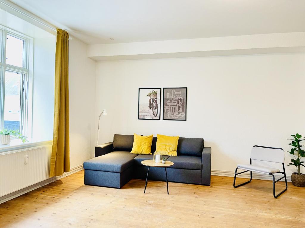Posezení v ubytování aday - Sunshine apartment in the heart og Hjorring