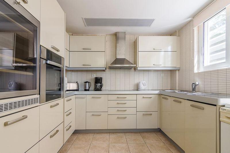 Kuchyň nebo kuchyňský kout v ubytování Sunset Sea View Maisonette Anavissos
