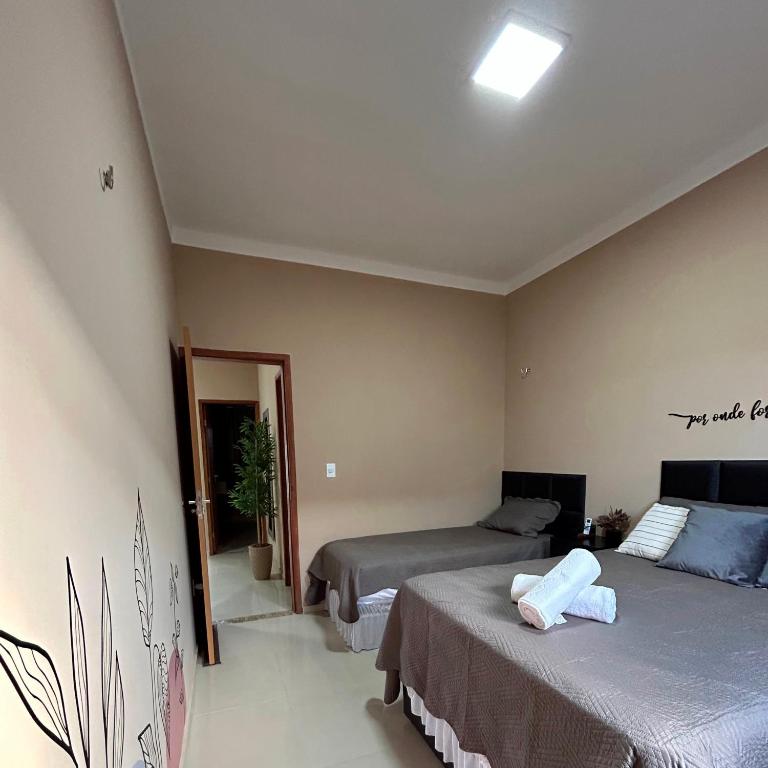 Postel nebo postele na pokoji v ubytování Dunas Residence - Casa 11