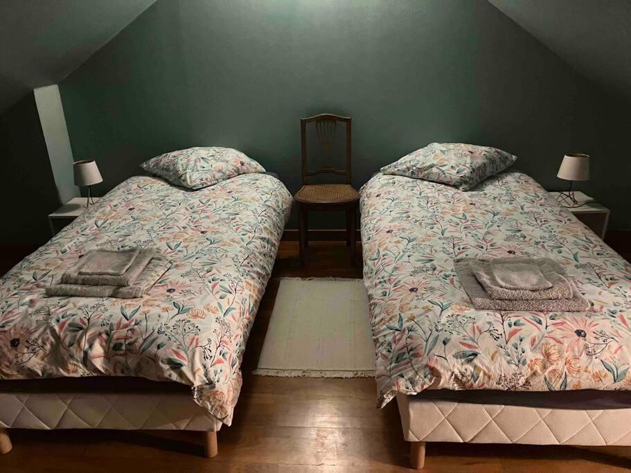 Postel nebo postele na pokoji v ubytování Grand Triplex vue mer centre du village