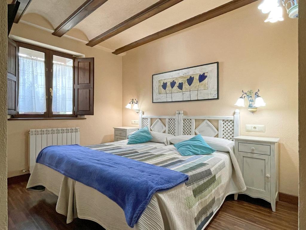 Postel nebo postele na pokoji v ubytování Casa Rural juaningratxi
