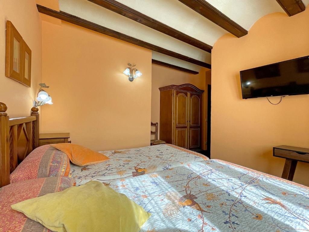 Postel nebo postele na pokoji v ubytování Casa Rural juaningratxi