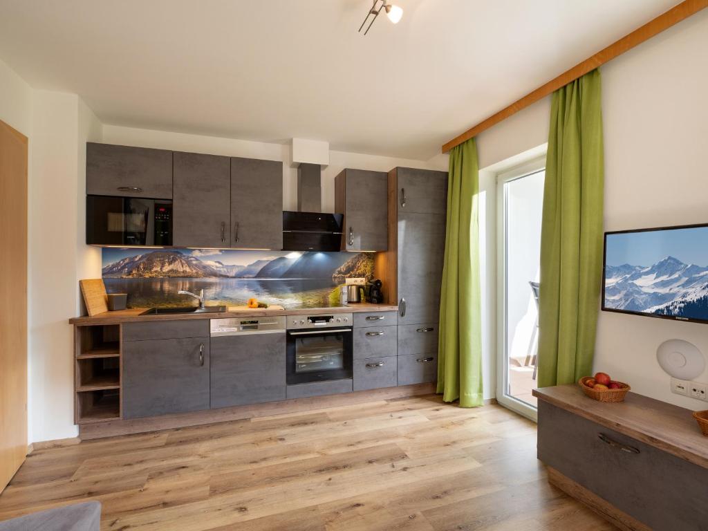 Kuchyň nebo kuchyňský kout v ubytování Appartementhaus Arbiskogelblick