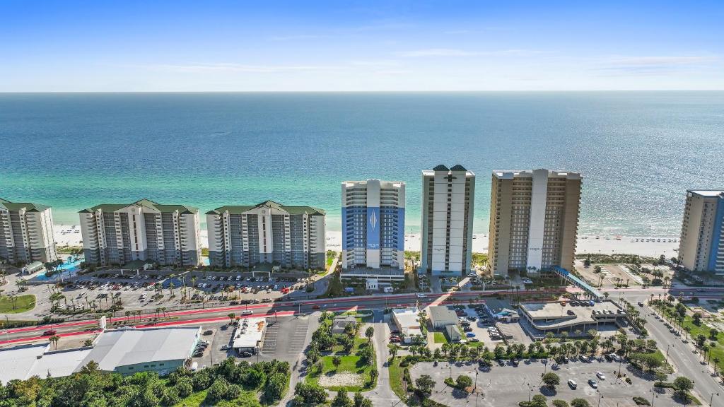 an aerial view of a resort near the ocean at Twin Palms Beach Resort by Panhandle Getaways in Panama City Beach