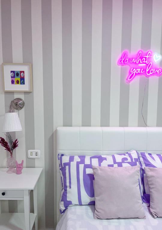Łóżko lub łóżka w pokoju w obiekcie Fifteen Apartment