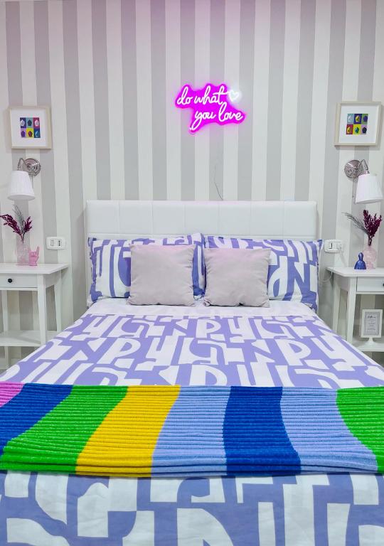 Łóżko lub łóżka w pokoju w obiekcie Fifteen Apartment