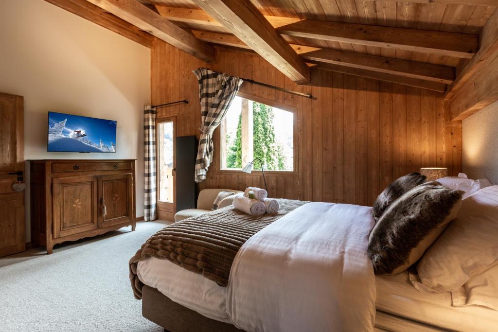 Postel nebo postele na pokoji v ubytování Megève - Chalet Miage
