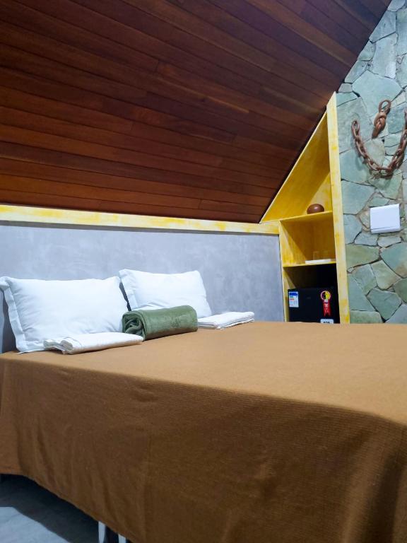 Postel nebo postele na pokoji v ubytování Recanto Alto da Serra