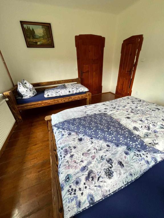 Postel nebo postele na pokoji v ubytování Vila Kučera