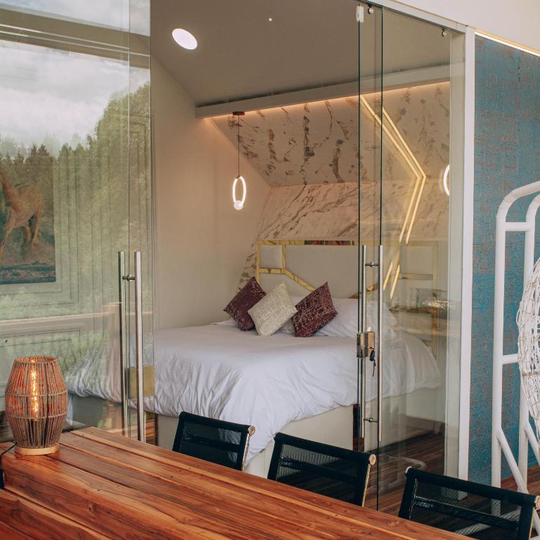 Postel nebo postele na pokoji v ubytování Örök Hotel