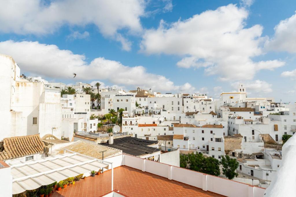 a view of a city from the roof of a building at Casa La Fontana 1 in Vejer de la Frontera