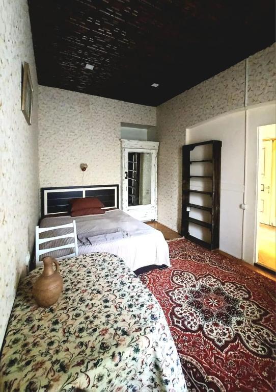 Postel nebo postele na pokoji v ubytování Sani house.