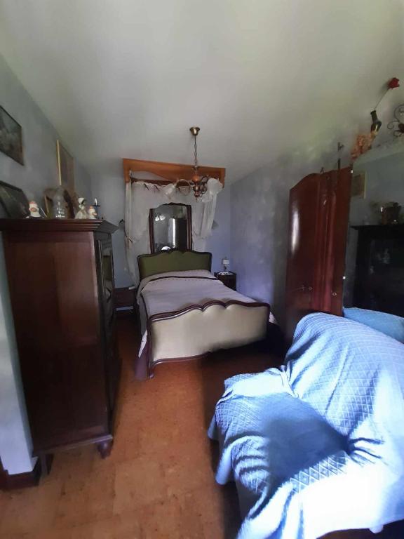 Una cama o camas en una habitación de Ferme Arboucau
