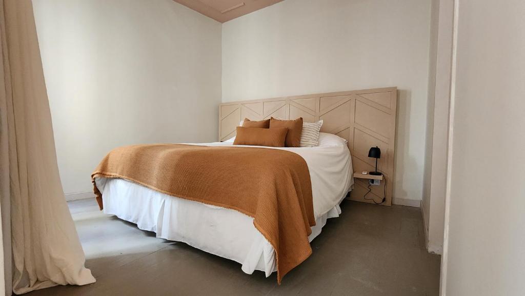 Postel nebo postele na pokoji v ubytování Casa Par Grand Suites