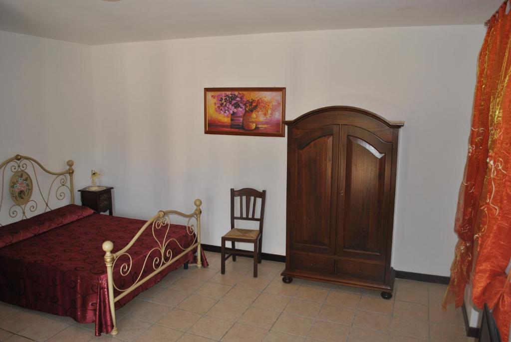 Postel nebo postele na pokoji v ubytování Tenuta La Spezia