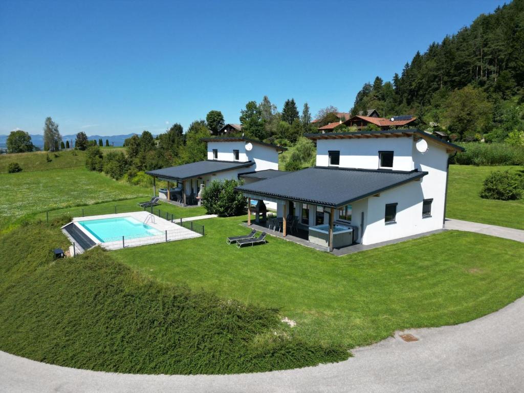 an aerial view of a house with a swimming pool at Ferienhaus Kaiser in Gallizien