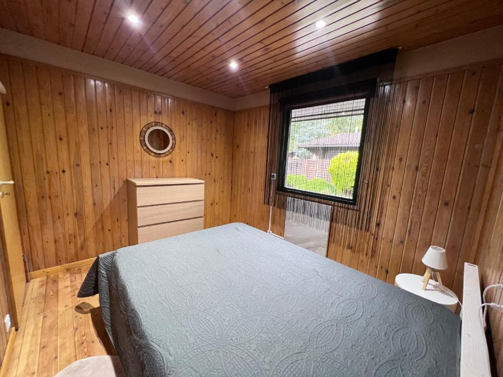 Postel nebo postele na pokoji v ubytování Spacieux chalet à Aywaille