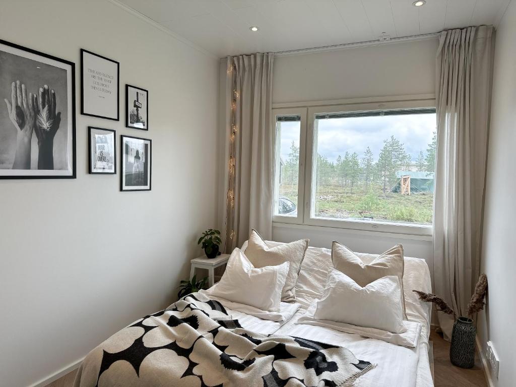 Postel nebo postele na pokoji v ubytování Snow Heaven Suites