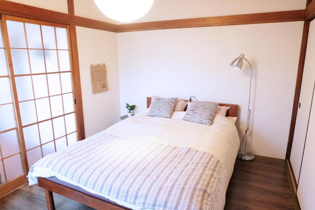 Postelja oz. postelje v sobi nastanitve Daiichi Mitsumi Corporation - Vacation STAY 15355