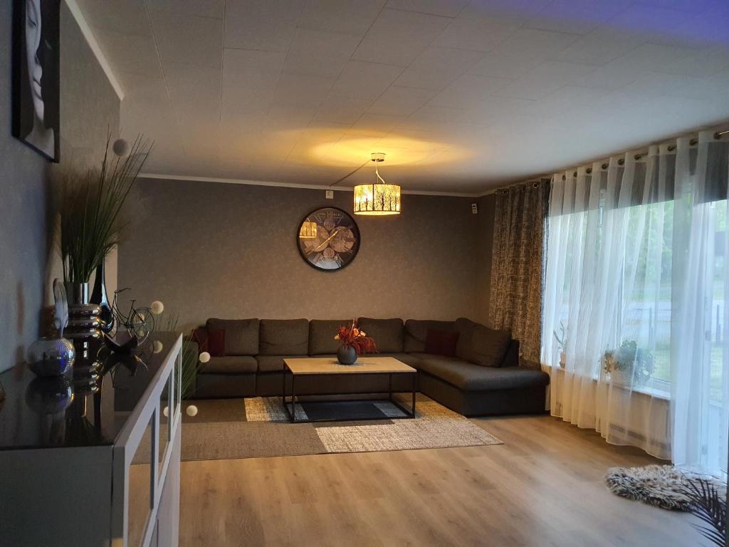 Posezení v ubytování Villa for 10 persons with massage chair, sauna, billiard table and free electric vehicle station for electric cars