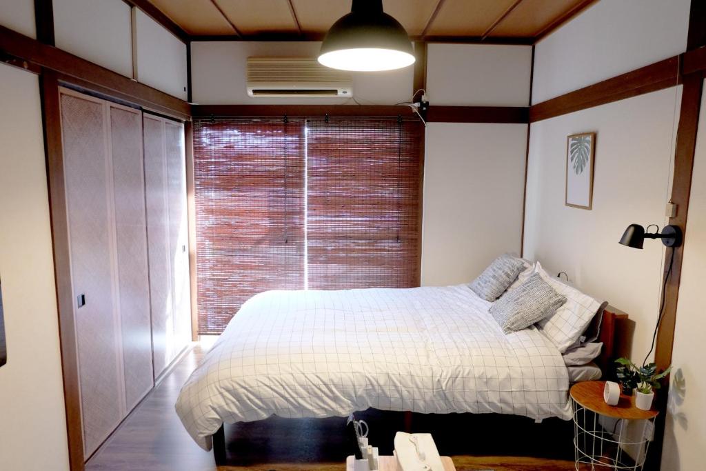 Säng eller sängar i ett rum på Daiichi Mitsumi Corporation - Vacation STAY 15348