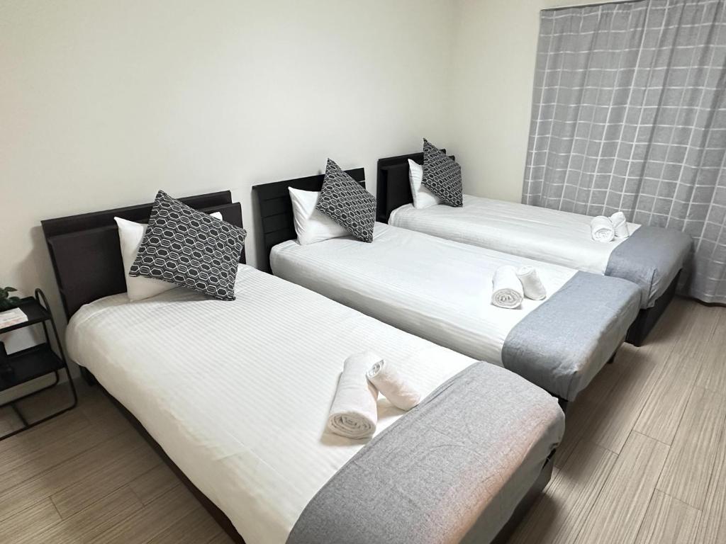 En eller flere senge i et værelse på Kiyomizu Sannenzaka Home in Kyoto - Vacation STAY 33820v
