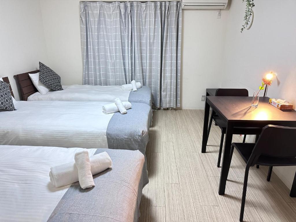 Krevet ili kreveti u jedinici u okviru objekta Kiyomizu Sannenzaka Home in Kyoto - Vacation STAY 33767v