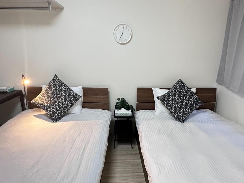 Säng eller sängar i ett rum på Kiyomizu Sannenzaka Home in Kyoto - Vacation STAY 33824v