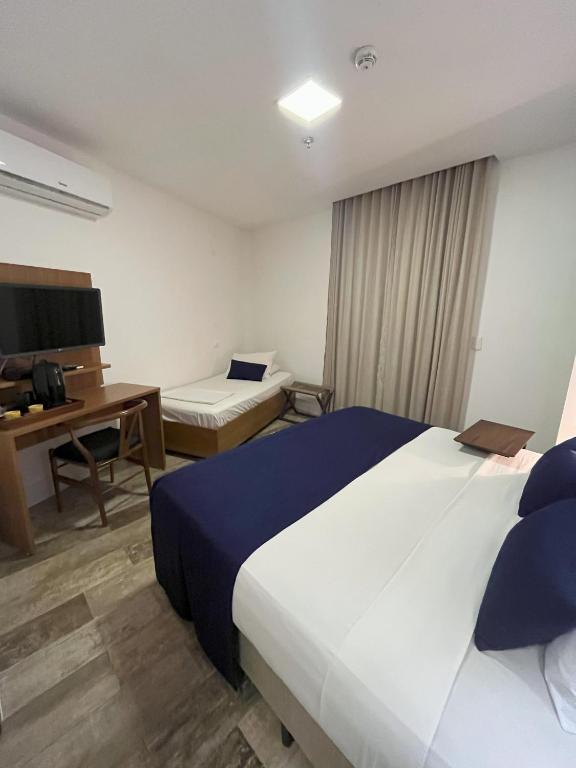 Krevet ili kreveti u jedinici u objektu Leblon Design Hotel